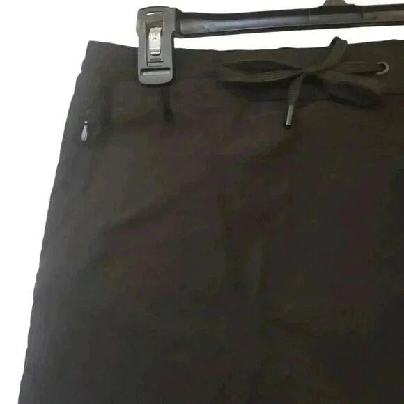 Eddie Bauer Women's Black Nylon/Spandex Tulip Faux Wrap Drawstring Skort - Picture 3 of 13